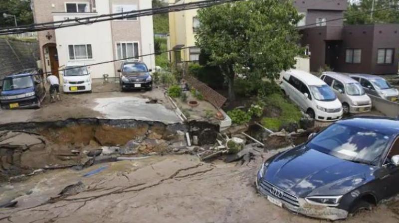 Cars are stuck in mud covered road after an earthquake in Sapporo, Hokkaido, northern Japan, Thursday, Sept. 6, 2018. (Photo: AP)