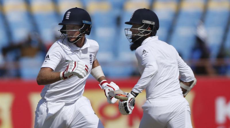 Joe Root (124) and Moeen Ali (99 not out) rebuild the England innings after England had lost three wickets before lunch and powered the team to 311/4 on day one of the first Test. (Photo: AP)