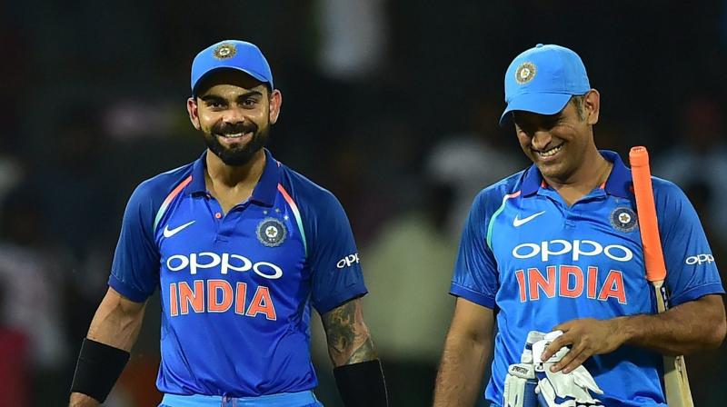 Indias Virat Kohli and Mahendra Singh Dhoni after their win in the match against SriLanka during the fifth ODI match in Colombo, Sri Lanka, on Sunday. (Photo: AP)