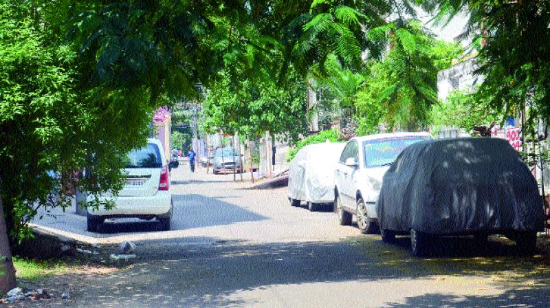 A view of the Santhipuram Colony where cars have been parked beside the road.(Photo: DC)