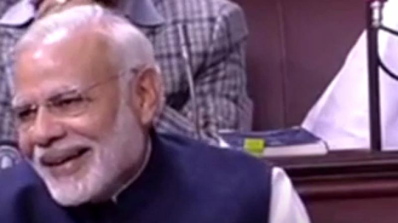 Prime MInister Narendra Modi laughes during debate in Rajya Sabha (Photo: Videograb)