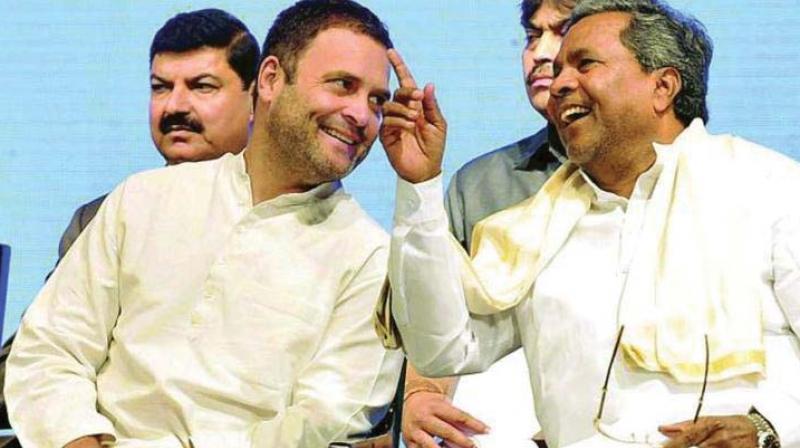 Congress president Rahul Gandhi and former chief minister and the coalitions co-ordination committee chairman Siddaramaiah in a file photo