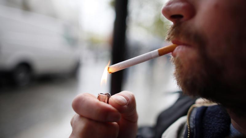 20 percent of adults in England reported smoking in 2010 and smoked an average of 12.7 cigarettes per day (Photo: AFP)