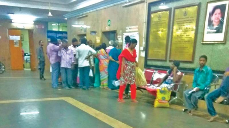 Visitors wait in serpentine queues outside the lift of the Rajiv Gandhi government general hospital. (Photo: DC)