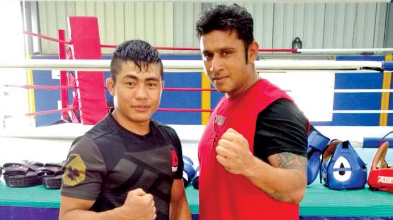 Roshan with coach Vishal