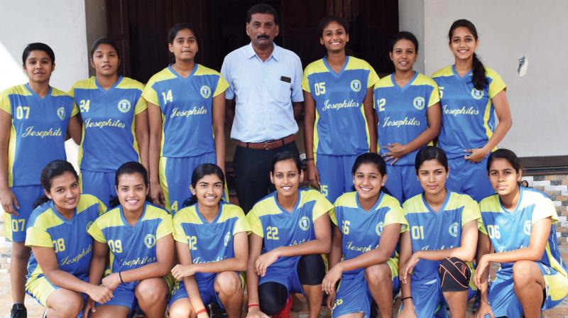 The basketball teams of St Josephs College, Irinjalakuda.