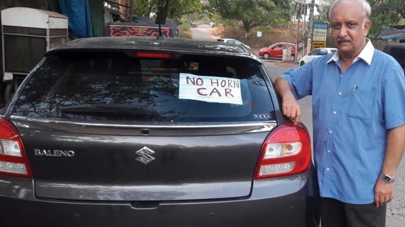 Prof Ambat Vijayakumar with his no horn car