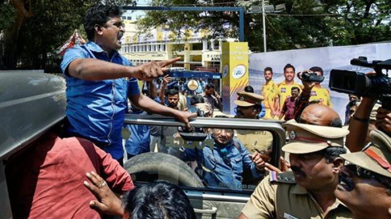 Police detain activists of Tamizhaga Vazhvurimai Katchi who were staging an anti-IPL protest outside MAC Stadium in Chennai on Tuesday. (Photo: PTI)