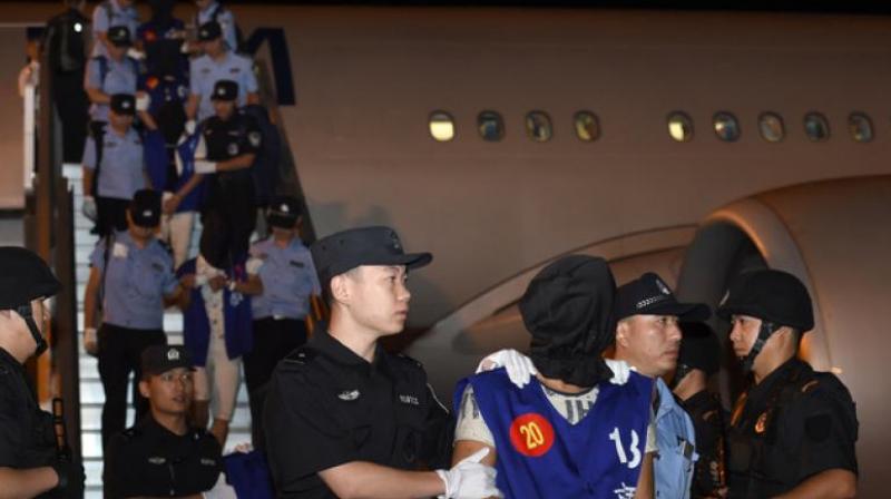 Beijing insists that Taiwanese fraud suspects should be sent to China to face trial because their telecom fraud crimes largely target mainland Chinese. (Photo: AFP)