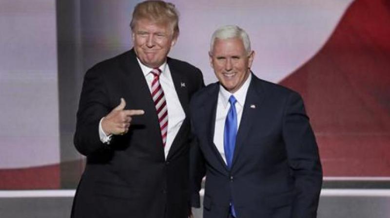 US President-elect Donald Trump meets with running mate Mike Pence. (Photo: AP)