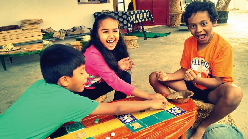 A picture of children playing a traditional game!.