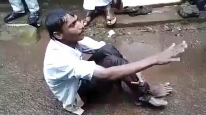 Murali during a sit-in protest in front of the Thennala panchayath office recently