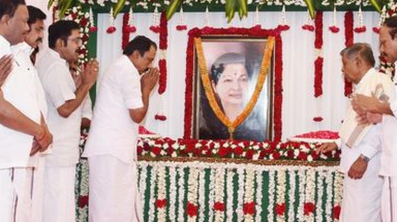 AIADMK deputy general secretary TTV Dinakaran and CM Palanisamy pay floral tribute to Jayalalithaa on Friday. (Photo: AIADMK/Twitter)