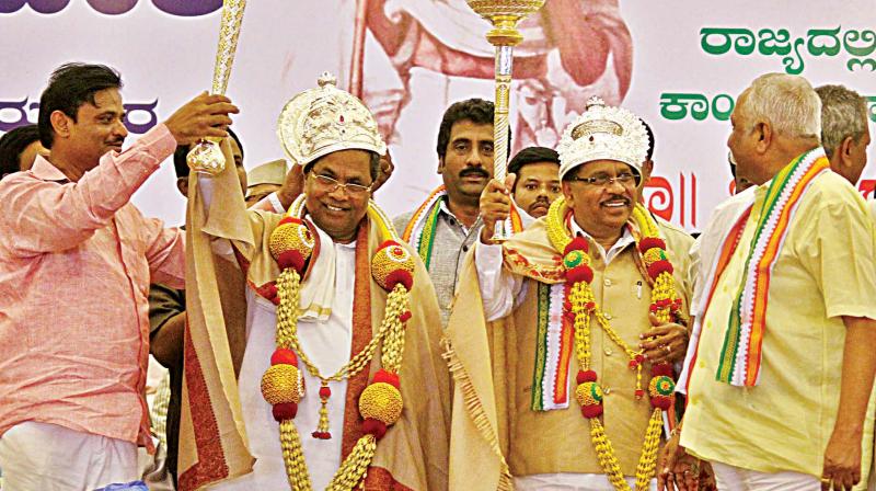 Chief Minister Siddaramaiah and KPCC president Dr G. Parameshwar at Surajya Samvesha organised by the Congress on Thursday.