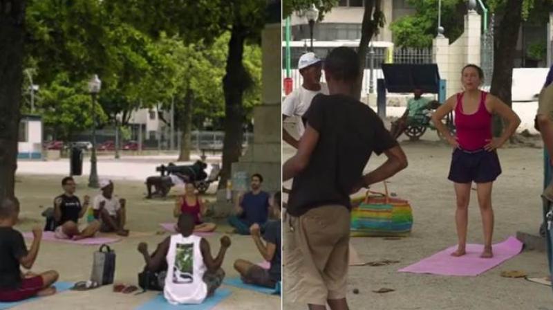 A group in Rio De Janeiro, Brazil, hold free yoga classes for the homeless on Mondays, Wednesdays, and Thursdays. (Credit: Facebook)