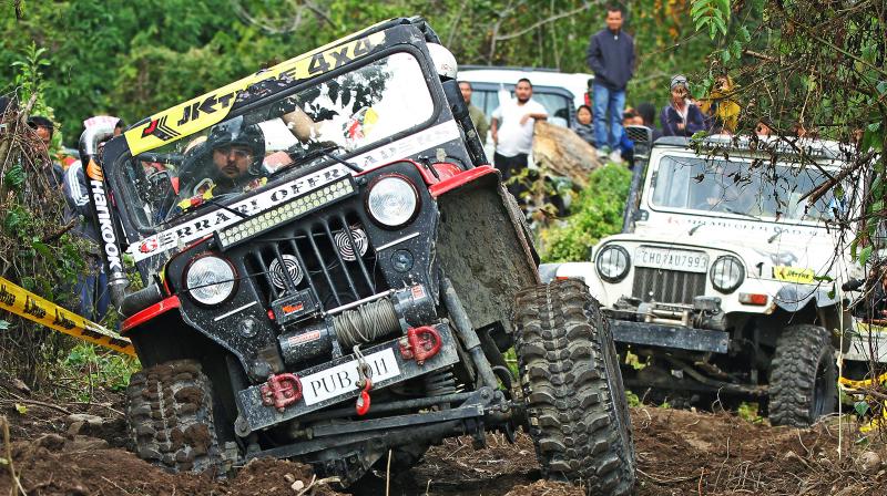 The day began with the parallel finish obstacle run that required the teams to race to the river bed, manoeuvre their vehicles in four feet deep water and change one tyre. (Photo: JK Tyre Motorsport)