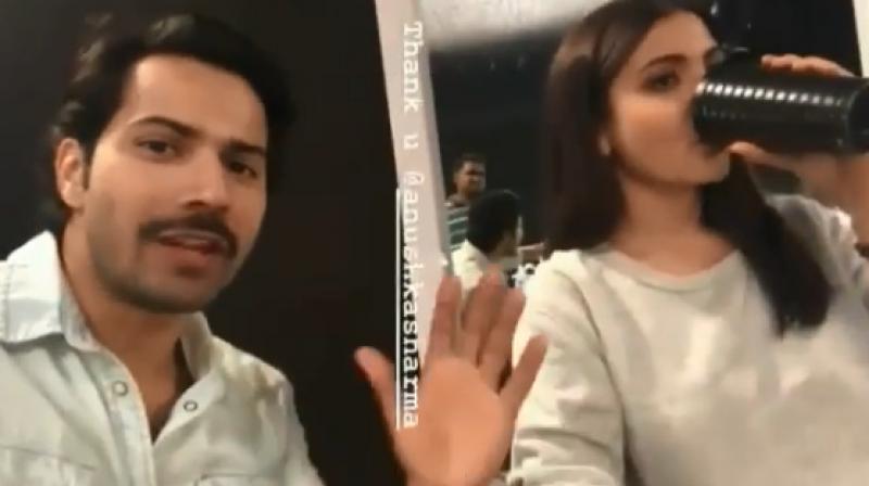 Varun Dhawan and Anushka in a still from the video.
