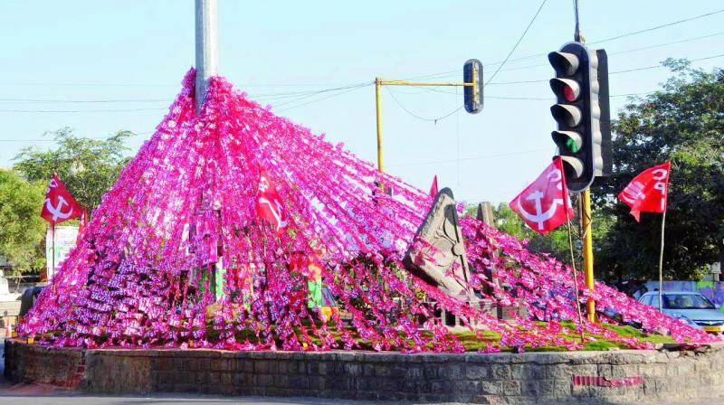A file photo of plastic flags of a political party tied up at Adalat junction. 	(Photo: DC)