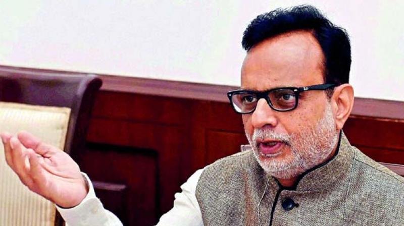 Revenue Secretary Hasmukh Adhia