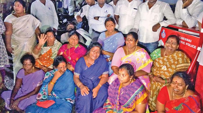 Women AIADMK cadres sitting heartbroken near Apollo hospitals, Greams road after hearing news about Chief Minister J. Jayalalithaas cardiac arrest on Sunday. (Photo: DC)