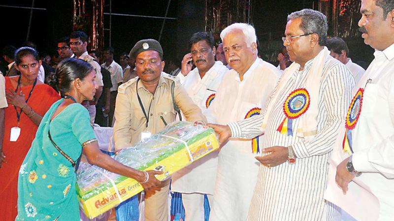 Chief MInister Siddaramaiah and Industries Minister R.V. Deshpande at the launch of developmental works in Uttara Kannada district on Wednesday. (Photo: DC)