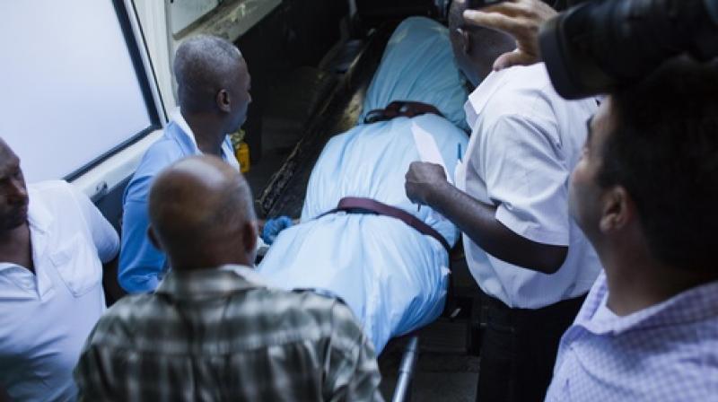 The body of Haitis late former President Rene Preval arrives to the Sainte Claire hospital in Petion-Ville, Haiti. Friday March 3, 2017. (Photo: AP)