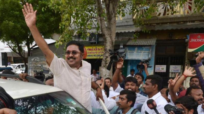 A beaming Dhinakaran told reporters in Madurai, We are the true AIADMK...people of RK Nagar have elected Ammas successor. (Photo: PTI)