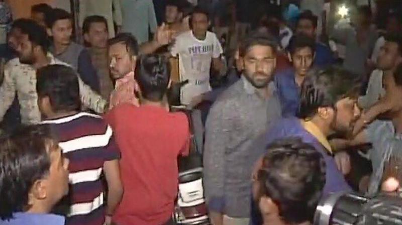 Soon after the list was released, PAAS workers, led by Hardik Patel, expressed anger and started protesting in various parts of the state claiming they were not given proper representation. (Photo: Twitter | ANI)
