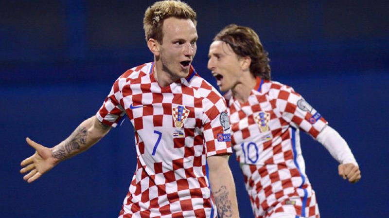 In possibly their last World Cup as midfield partners, Luka Modric and Ivan Rakitic were named Monday in the provisional Croatia squad for the tournament in Russia. (Photo: AFP)
