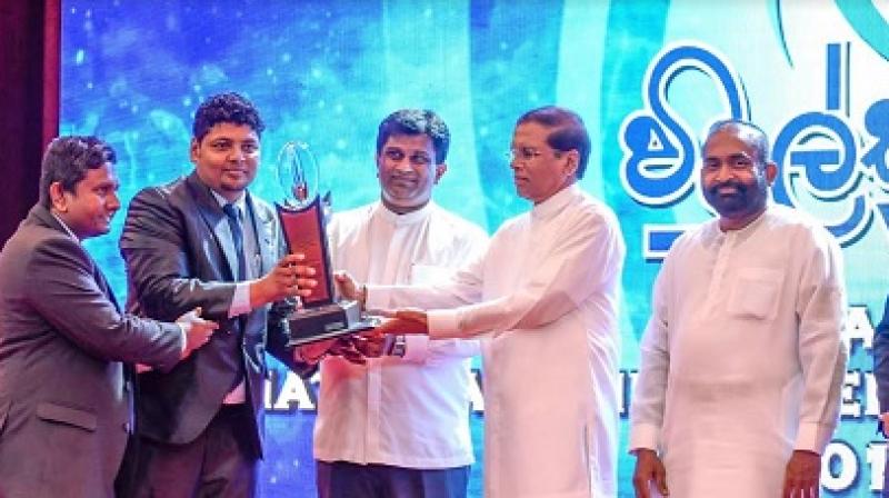Loshan Palayangoda (Operations Manager) and Chanaka Mahawatta (Product Manager) receiving the award from Deputy Minister Ajith. P. Perera and Honorable President of Srilanka Maithripala Sirisena. Also in the picture - Ranjith Siyambalapitiya (Minister of