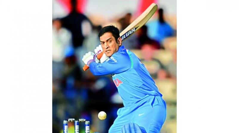 MS.Dhoni in action on the cricket field.