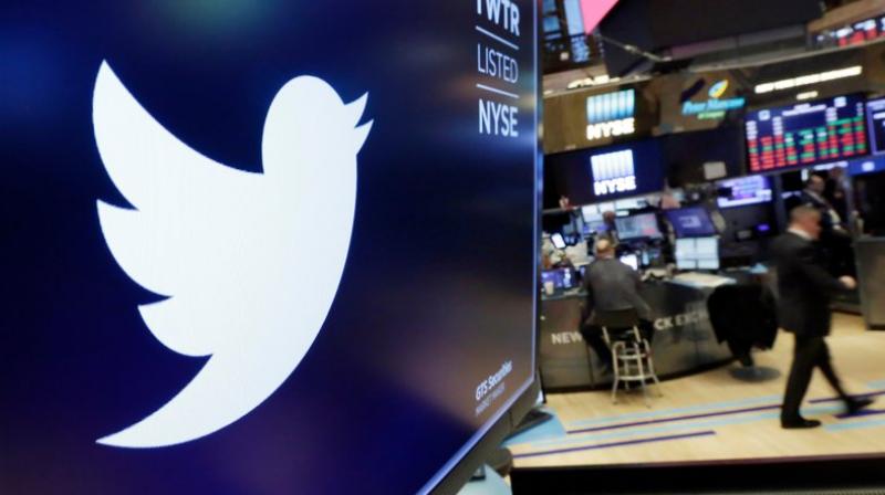 The logo for Twitter is displayed above a trading post on the floor of the New York Stock Exchange. Twitters view is that keeping up political figures controversial tweets encourages discussion and helps hold leaders accountable. (AP Photo/Richard Drew, File)