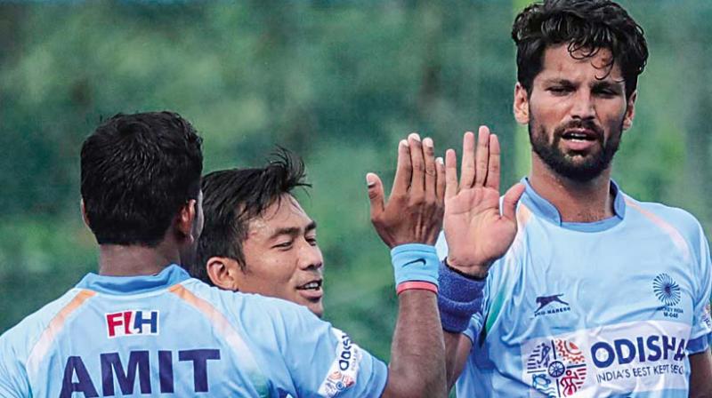 Indian players celebrate their 3-1 victory over New Zealand in Bengaluru on Saturday.