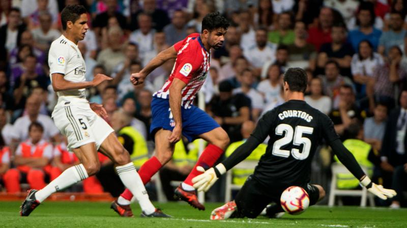 Thibaut Courtois came back to haunt his former club and Jan Oblak showed why he is considered arguably the finest goalkeeper in the world. (Photo: AFP)