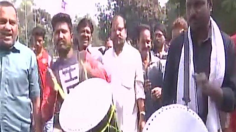Congress workers celebrate outside MP Congress Committee office after partys win in Chitrakoot assembly bypoll. (Photo: ANI | Twitter)
