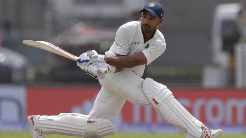 Dhawan fell short of his maiden double ton in Tests as he got out at the stroke of Tea on his individual score of 190. (Photo: AP)
