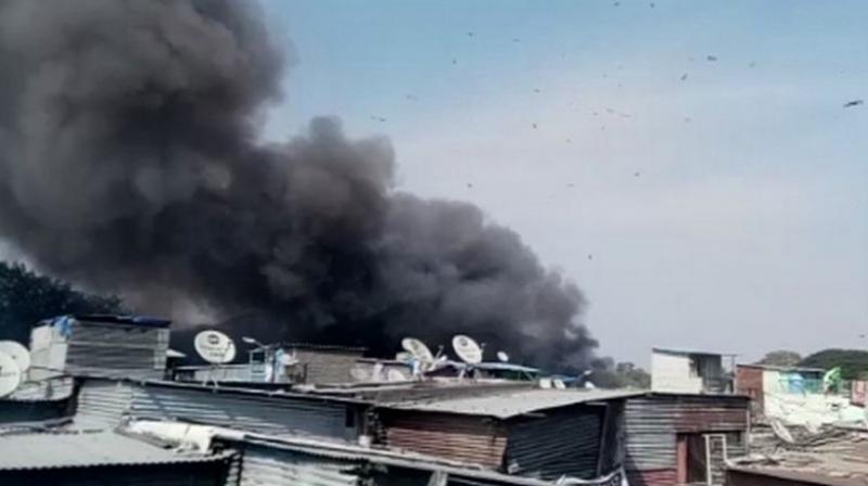 Massive fire broke out in a slum at Patil Estate Lane no 3, near Shivajinagar in Maharashtras Pune. (Photo: ANI)
