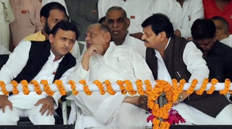 Uttar Pradesh Chief Minister Akhilesh Yadav with Samajwadi Party Supremo Mulayam Singh Yadav and party state president Shivpal Yadav (Photo: PTI)