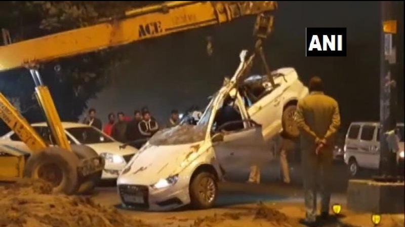 Three people died in an accident after the car they were travelling collided with a dumper in Rohini on Tuesday night. (Photo: ANI/Twitter)
