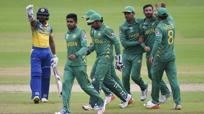 Pakistans Junaid Khan celebrates taking the wicket of Sri Lankas Danushka Gunathilaka during the ICC Champions Trophy, Group B cricket match (Photo: AP)