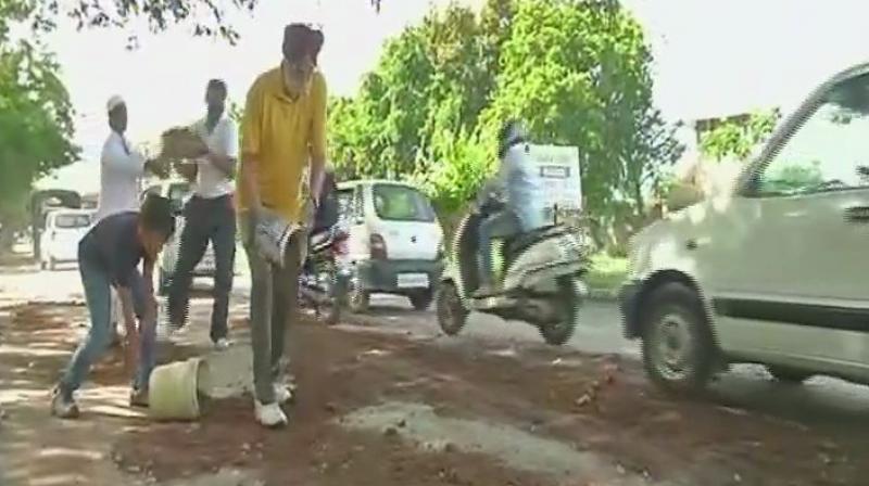 The senior citizens have been working continuously for the second week, as the roads are in poor condition and some of them need expansion. (Photo: ANI/Twitter)