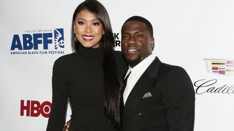 Kevin Hart with his wife.
