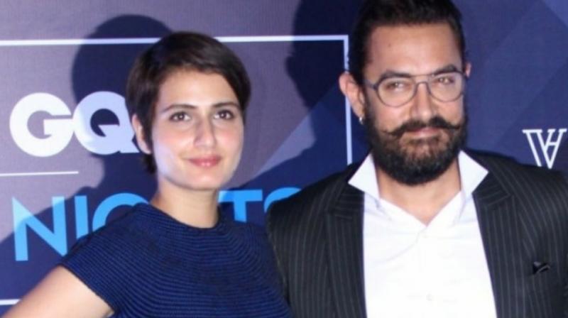 Aamir Khan and Fatima Sana Shaikh at an event.