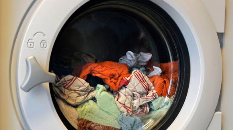 The twins were inside the top loading washing machine for up to 30 minutes before being discovered by their father.