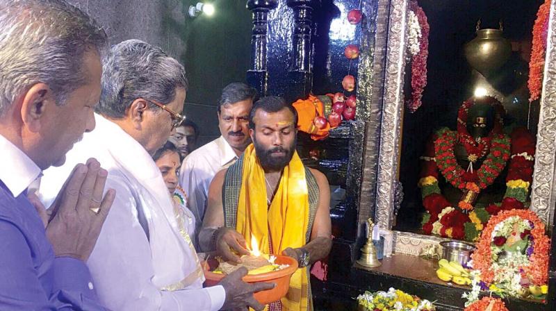 Chief Minister Siddaramaiah offers prayers at Malemahadeshwara Temple in Chamarajpet in Bengaluru on Friday on the occasion of Maha Shivarathri. (Photo: KPN)