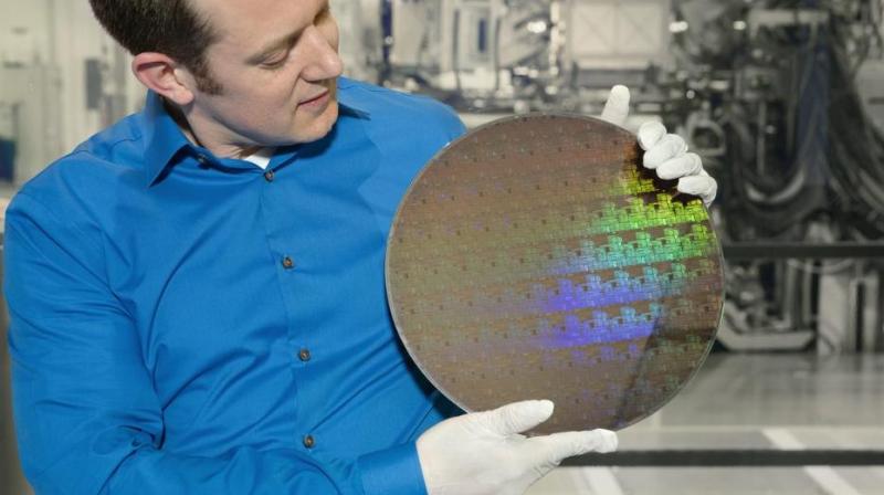 IBM Research scientist Nicolas Loubet holds a wafer of chips with 5nm silicon nanosheet transistors. (Image: IBM)