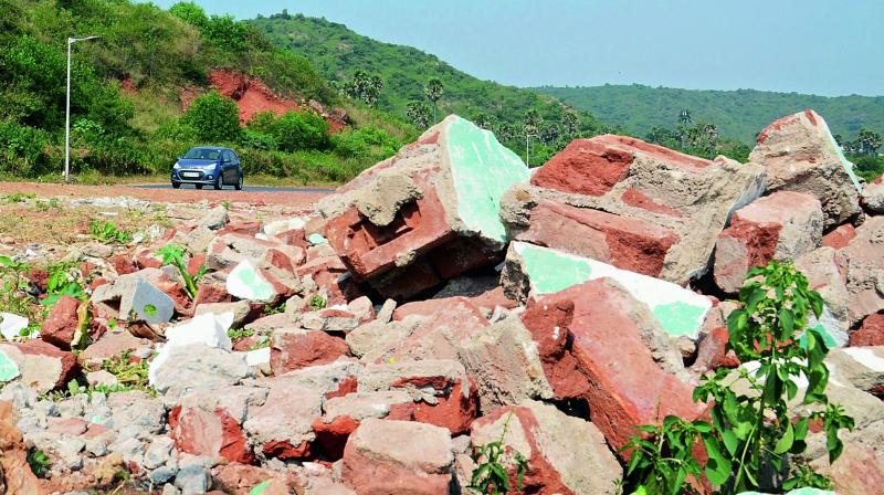 Construction waste dumped on the beach road in Visakhapatnam.  (Photo: DC)
