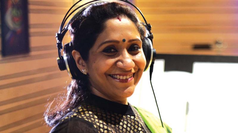 Singer Sujatha during a recording session