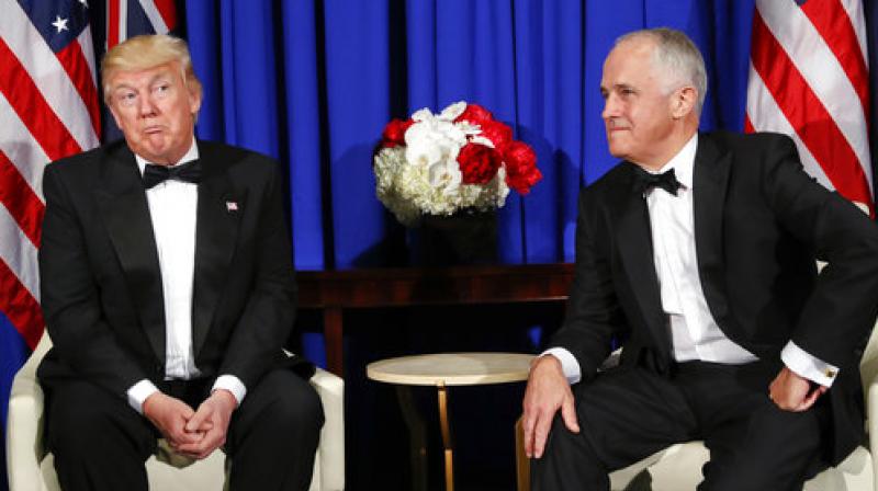 Donald Trump, Malcolm Turnbull President Donald Trump with Australian Prime Minister Malcolm Turnbull during their meeting aboard the USS Intrepid, a decommissioned aircraft carrier docked in the Hudson River in New York (Photo:AP)