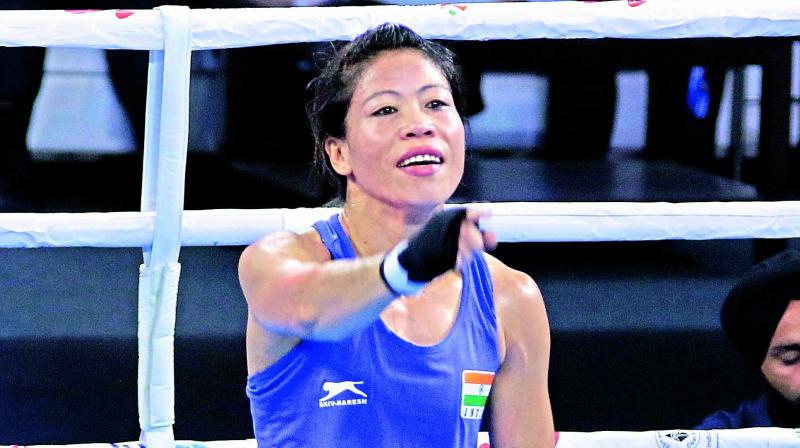 Mary Kom gestures after winning a bout at the recent World Boxing Championship in New Delhi.